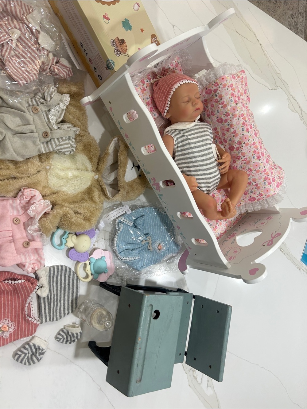 RebornBaby Doll with American girl desk, clothes and White Cradle